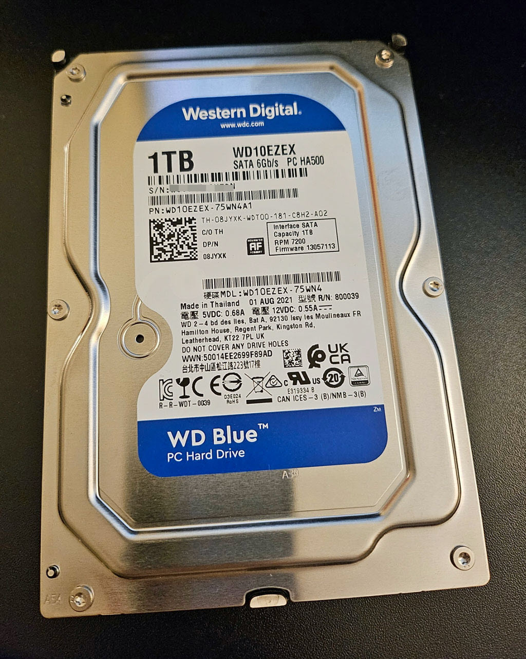 Western Digital 1TB hard disk drive (HDD).